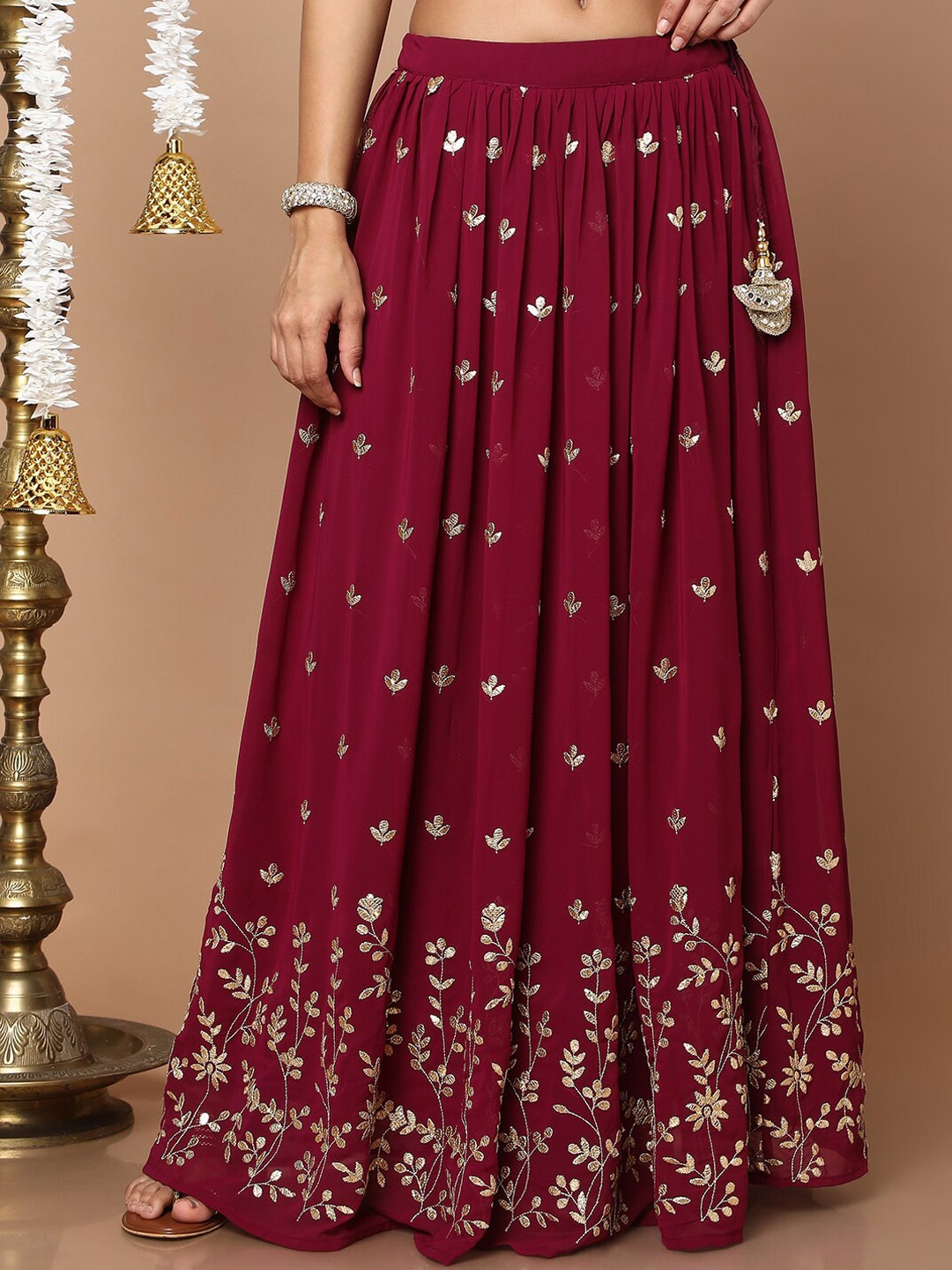 

SALWAR STUDIO Women Maroon & Gold-Toned Embellished Flared Maxi Skirts