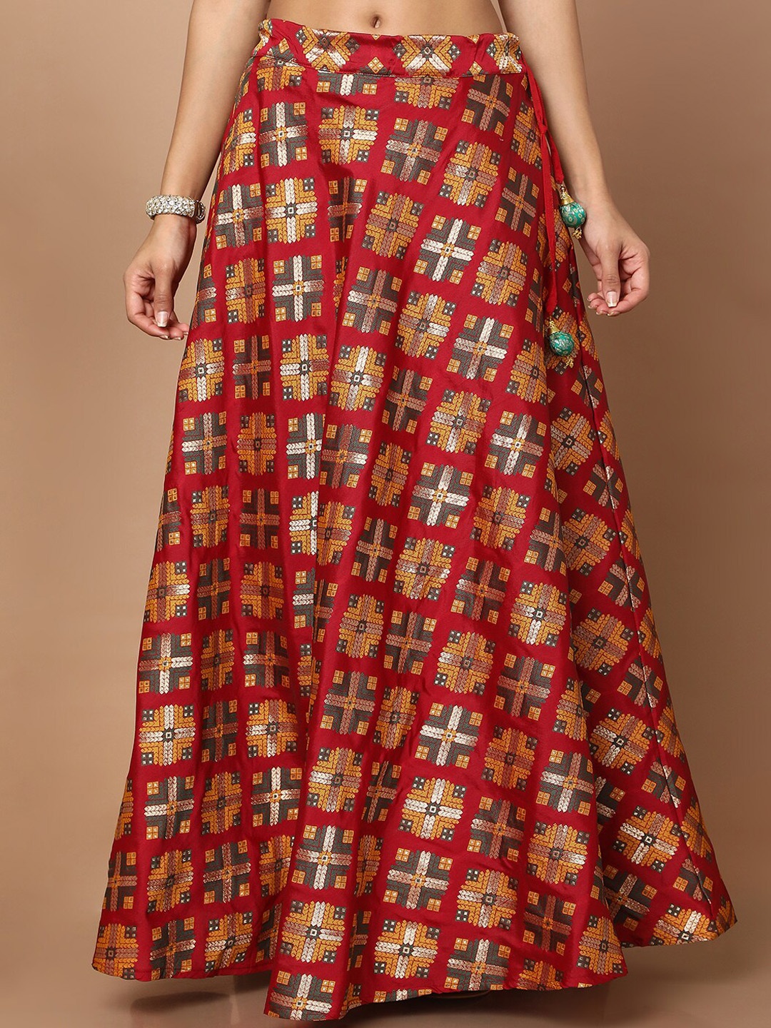 

SALWAR STUDIO Women Maroon & Yellow Printed Flared Maxi Skirts