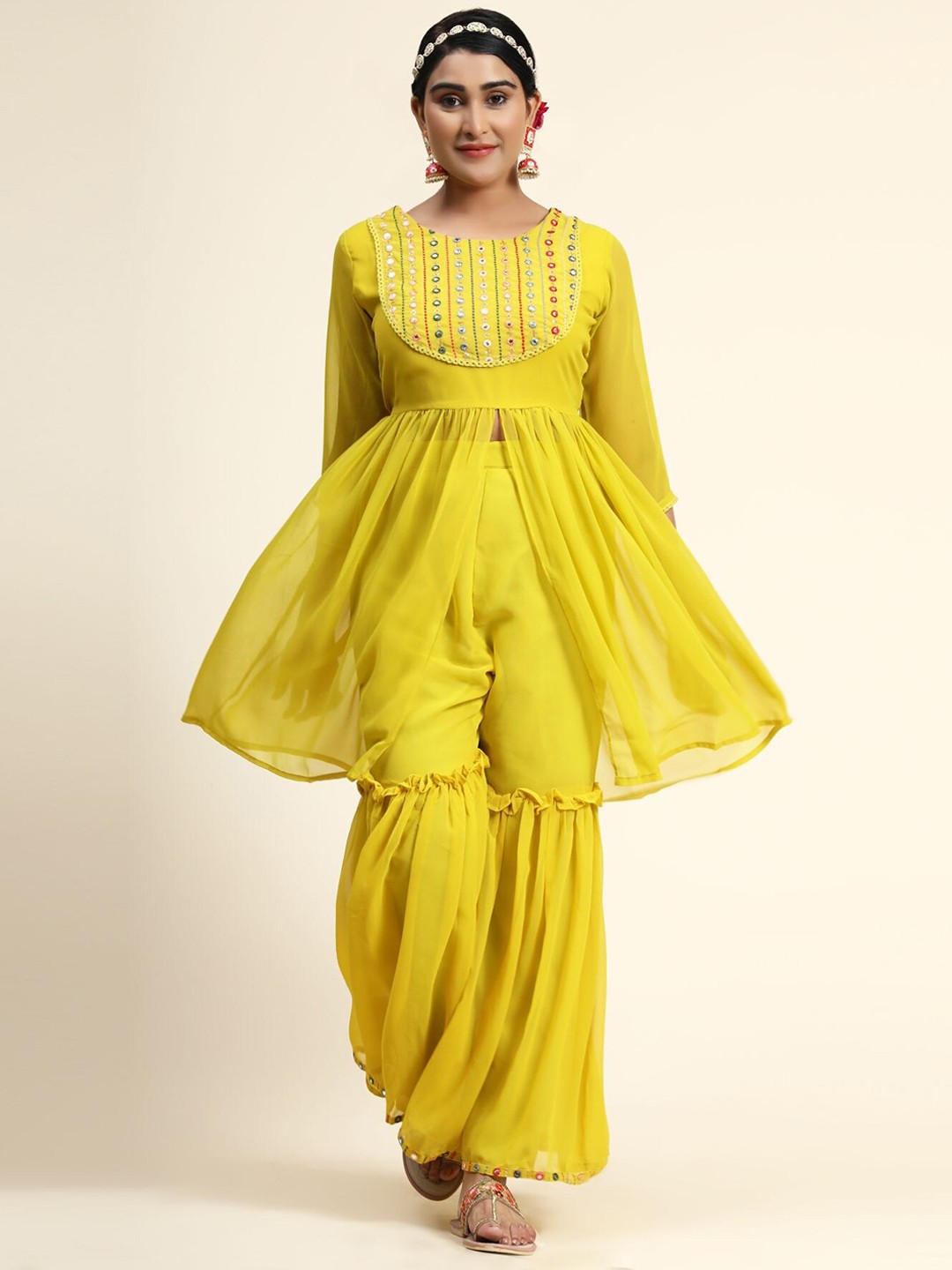 

KALINI Women Yellow Embroidered Mirror Work Kurta with Sharara