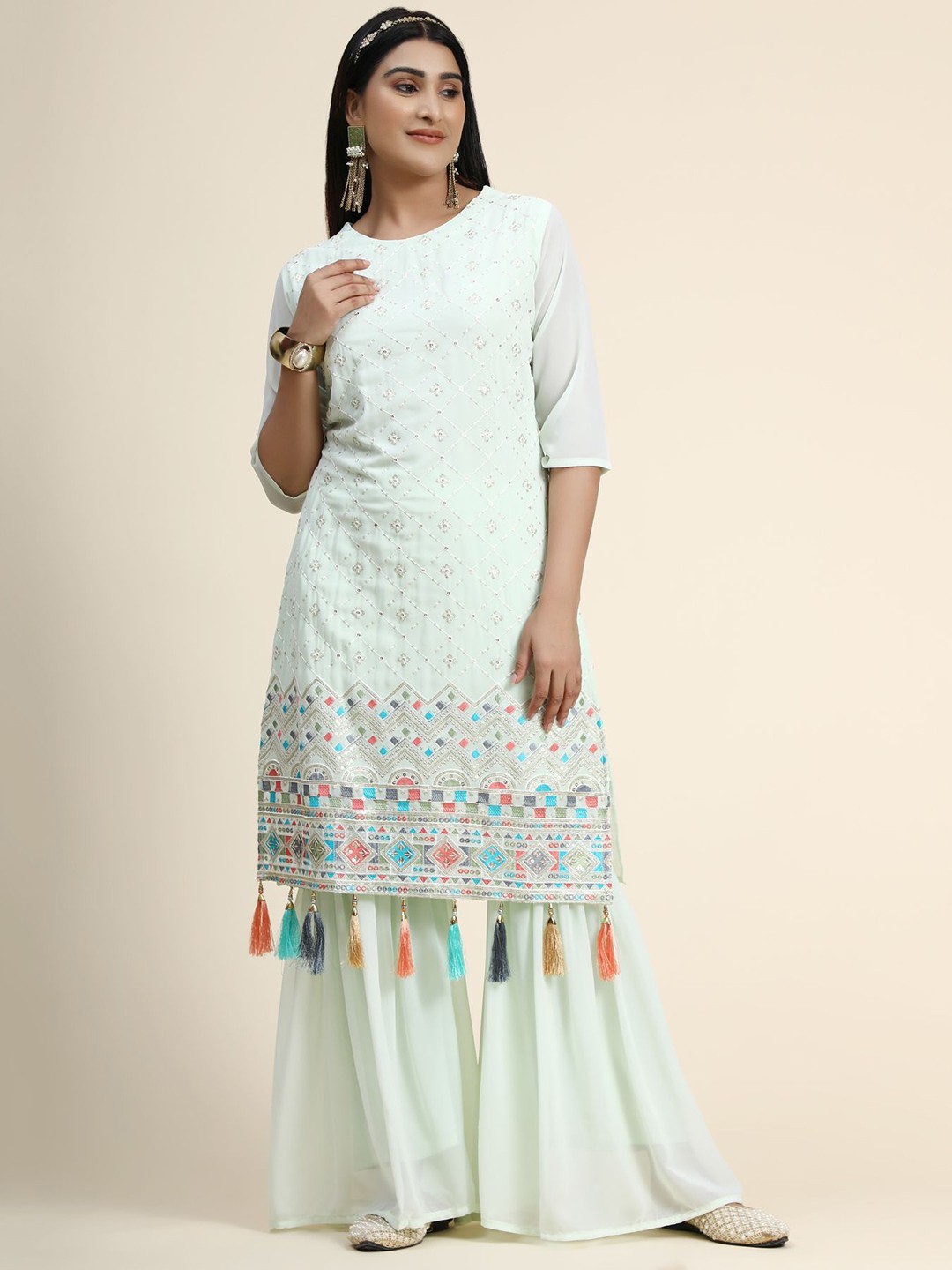 

KALINI Women Green Embroidered Kurta with Palazzos