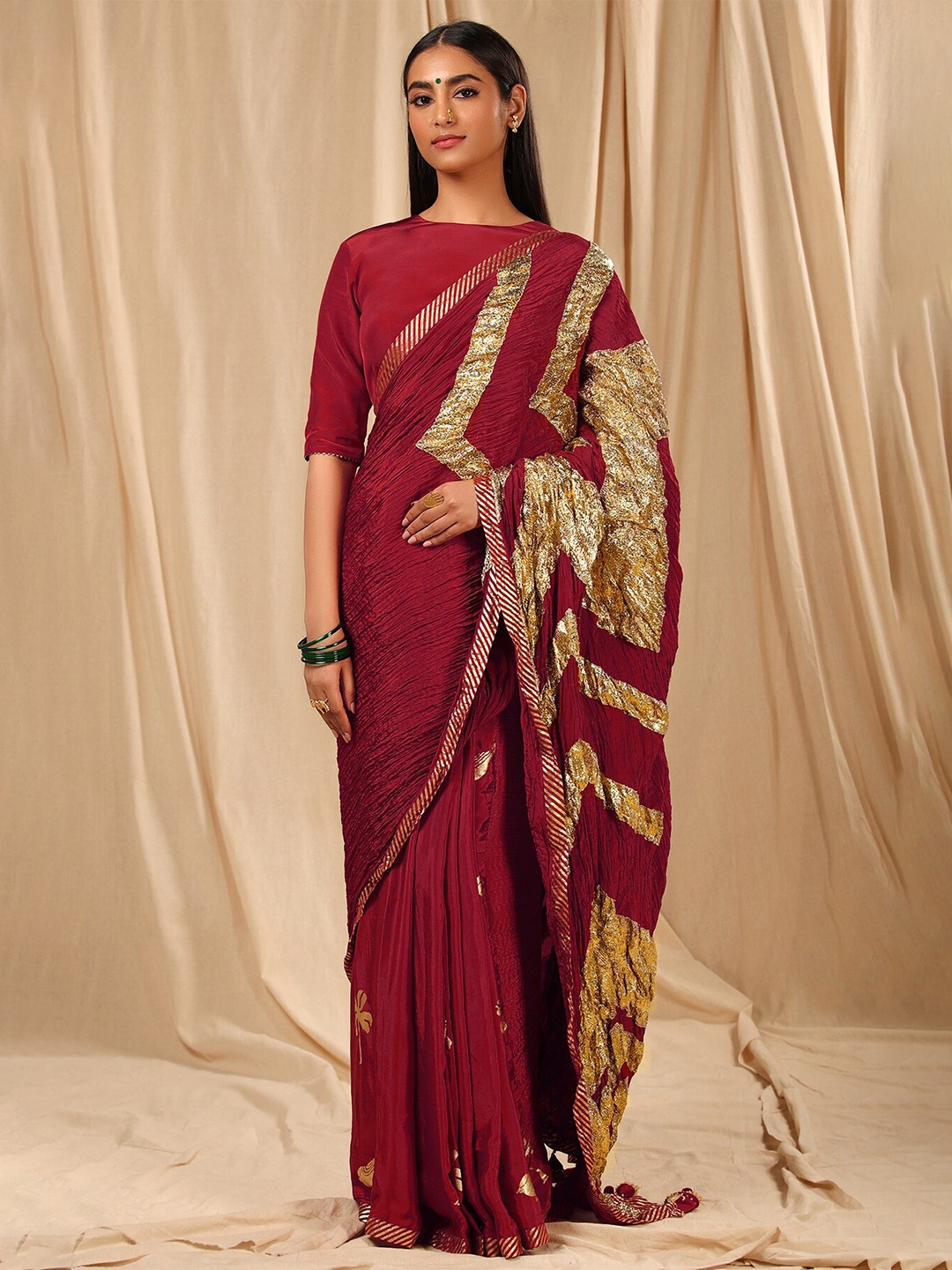 

Masaba Maroon & Gold-Toned Embellished Pure Crepe Saree