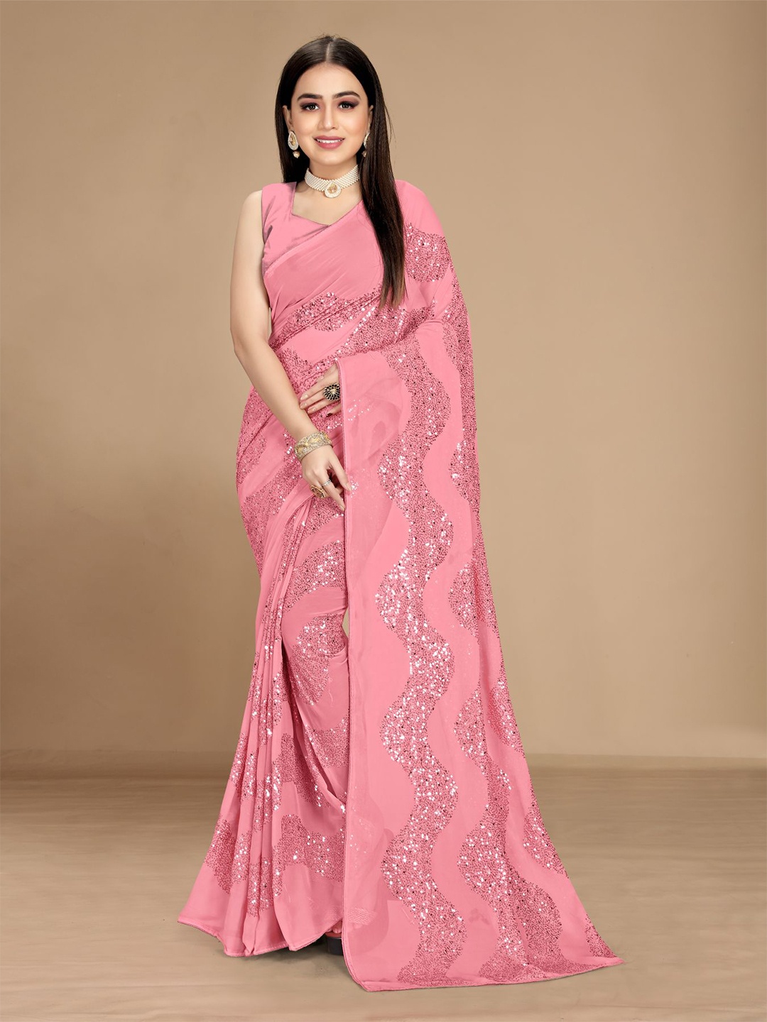 

VAIRAGEE Peach-Coloured Embellished Saree