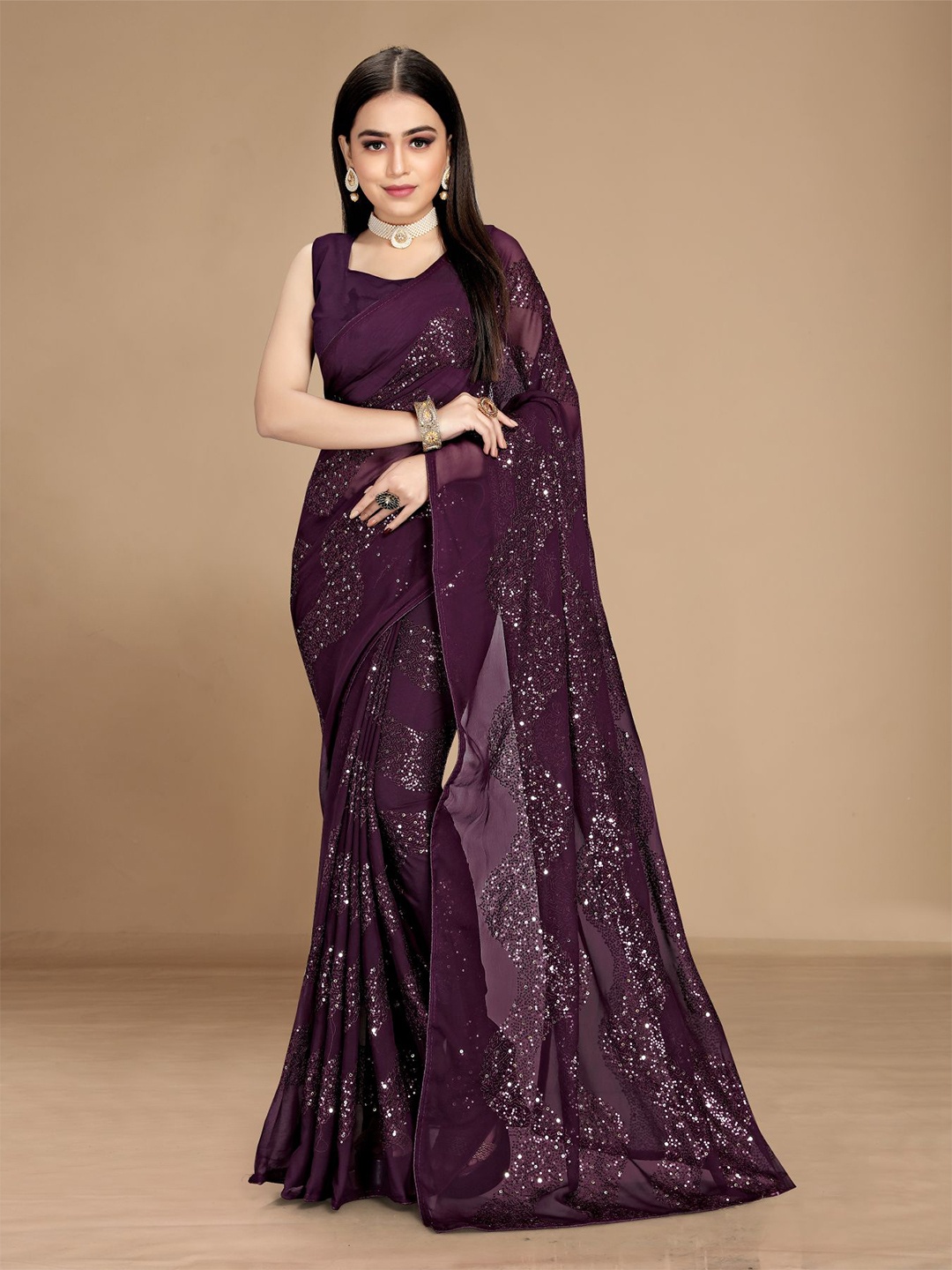 

VAIRAGEE Magenta Embellished Saree