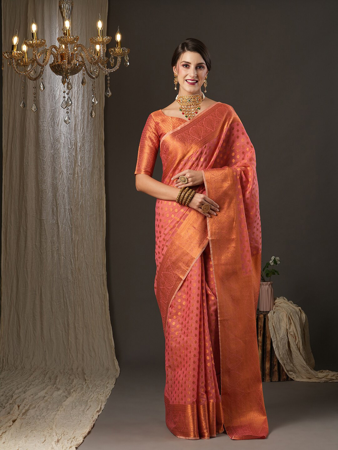 

Mitera Pink & Gold-Toned Ethnic Motifs Zari Silk Blend Banarasi Saree