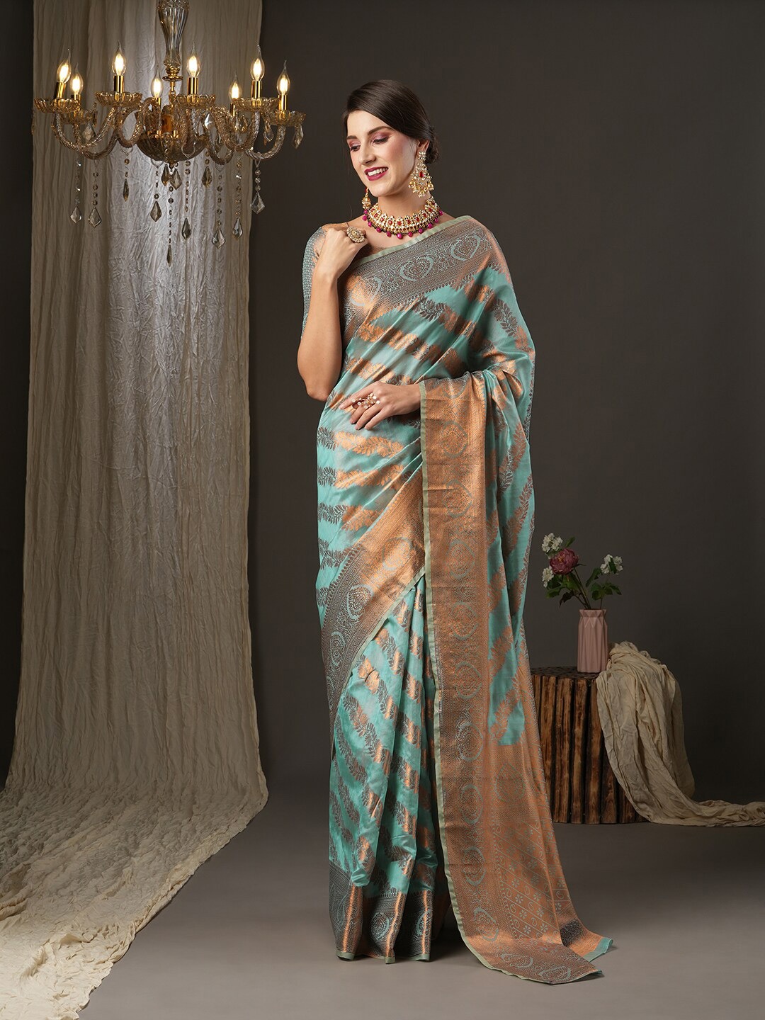 

Mitera Sea Green & Gold-Toned Ethnic Motifs Zari Silk Blend Banarasi Saree