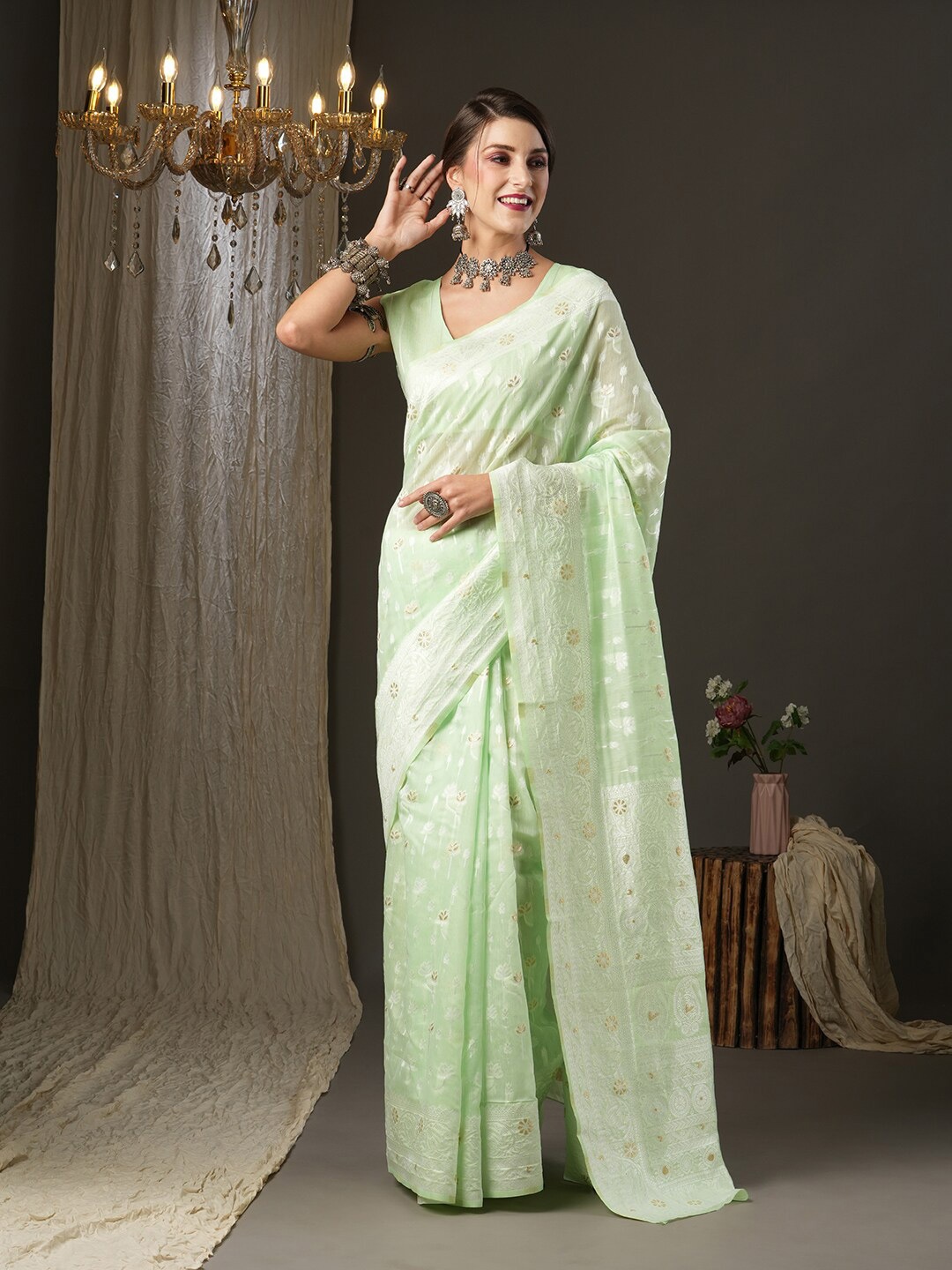 

Mitera Green Floral Zari Silk Cotton Muga Saree