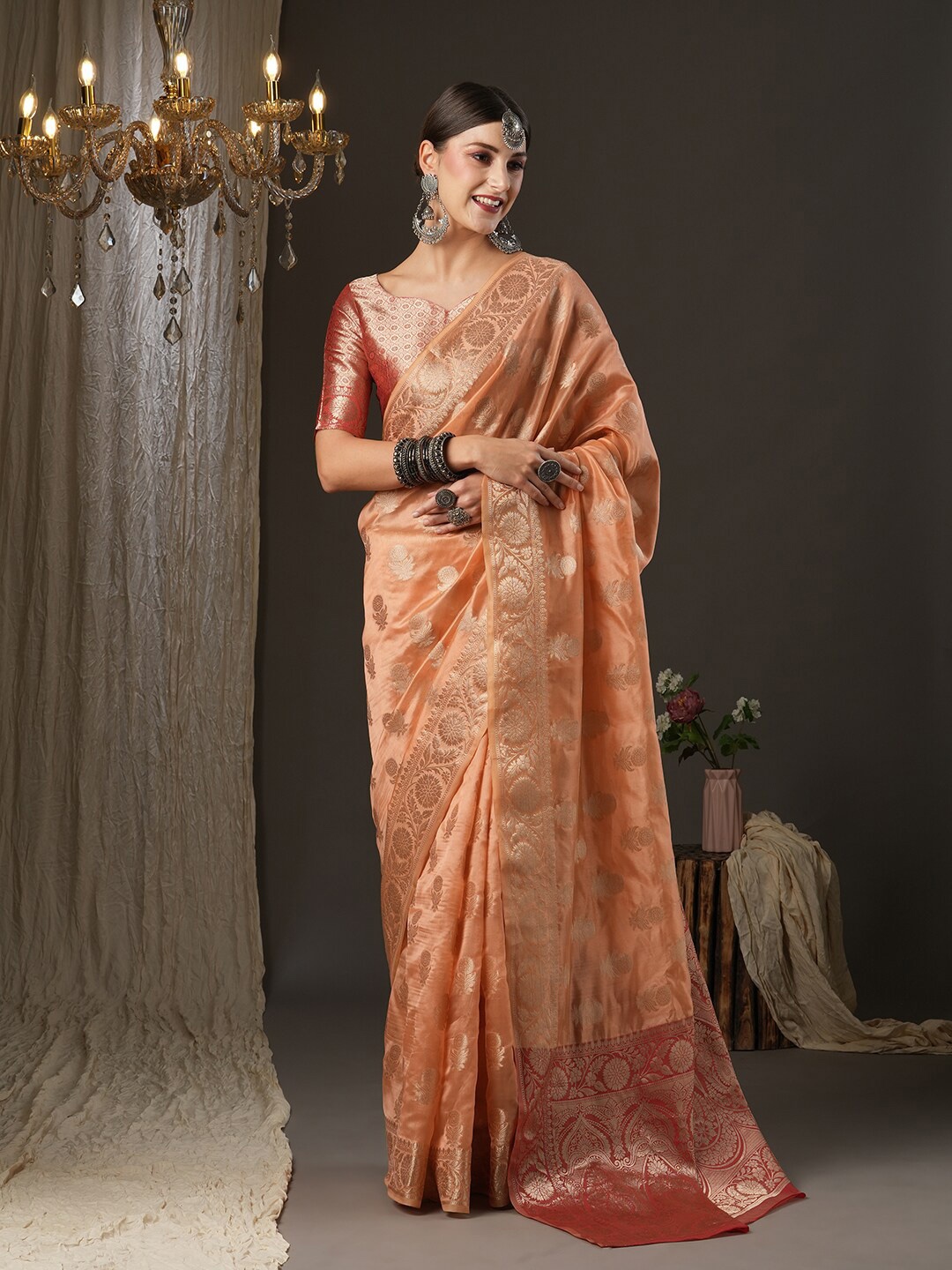 

Mitera Peach-Coloured & Red Ethnic Motifs Zari Organza Muga Saree