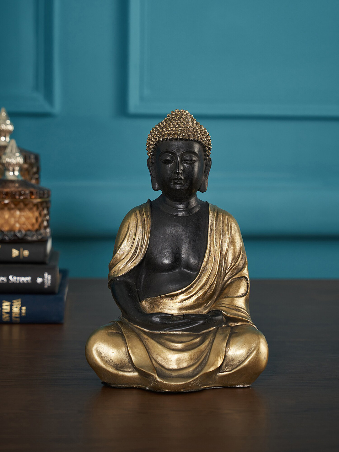 

Pure Home and Living Black & Gold Toned Meditating Buddha Showpiece
