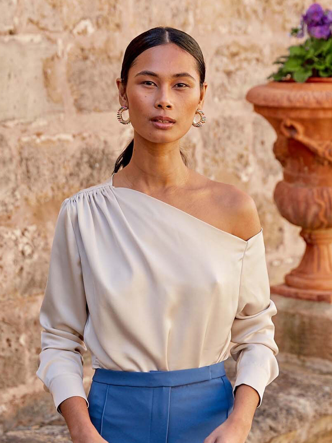 

KHUSHBOO AND PANKAJ White One Shoulder Satin Top