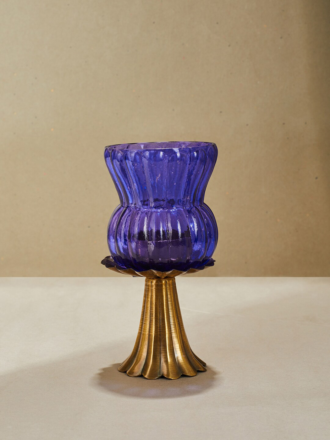 

Fabindia Purple & Gold Textured T-lite Candle Holder