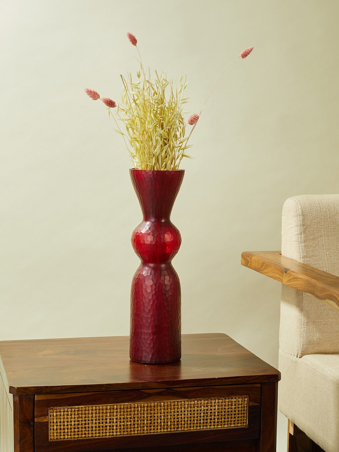 

Fabindia Red Solid Chiselled Vase