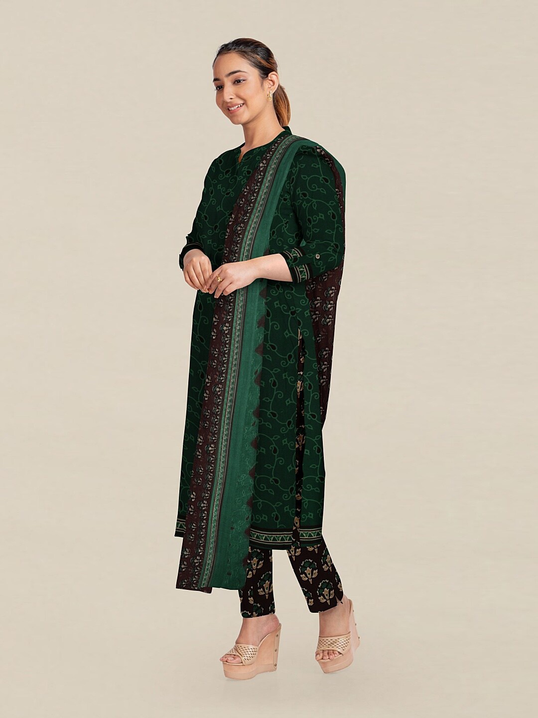 

Pothys Green & Brown Printed Unstitched Dress Material