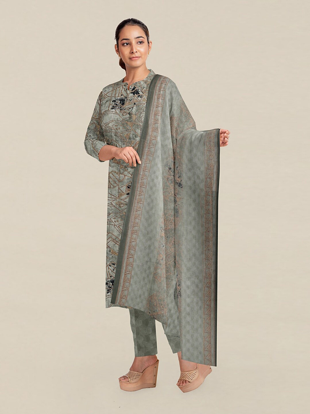 

Pothys Green Printed Unstitched Dress Material