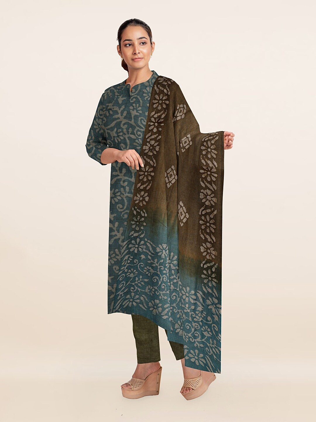 

Pothys Green & Brown Printed Unstitched Dress Material