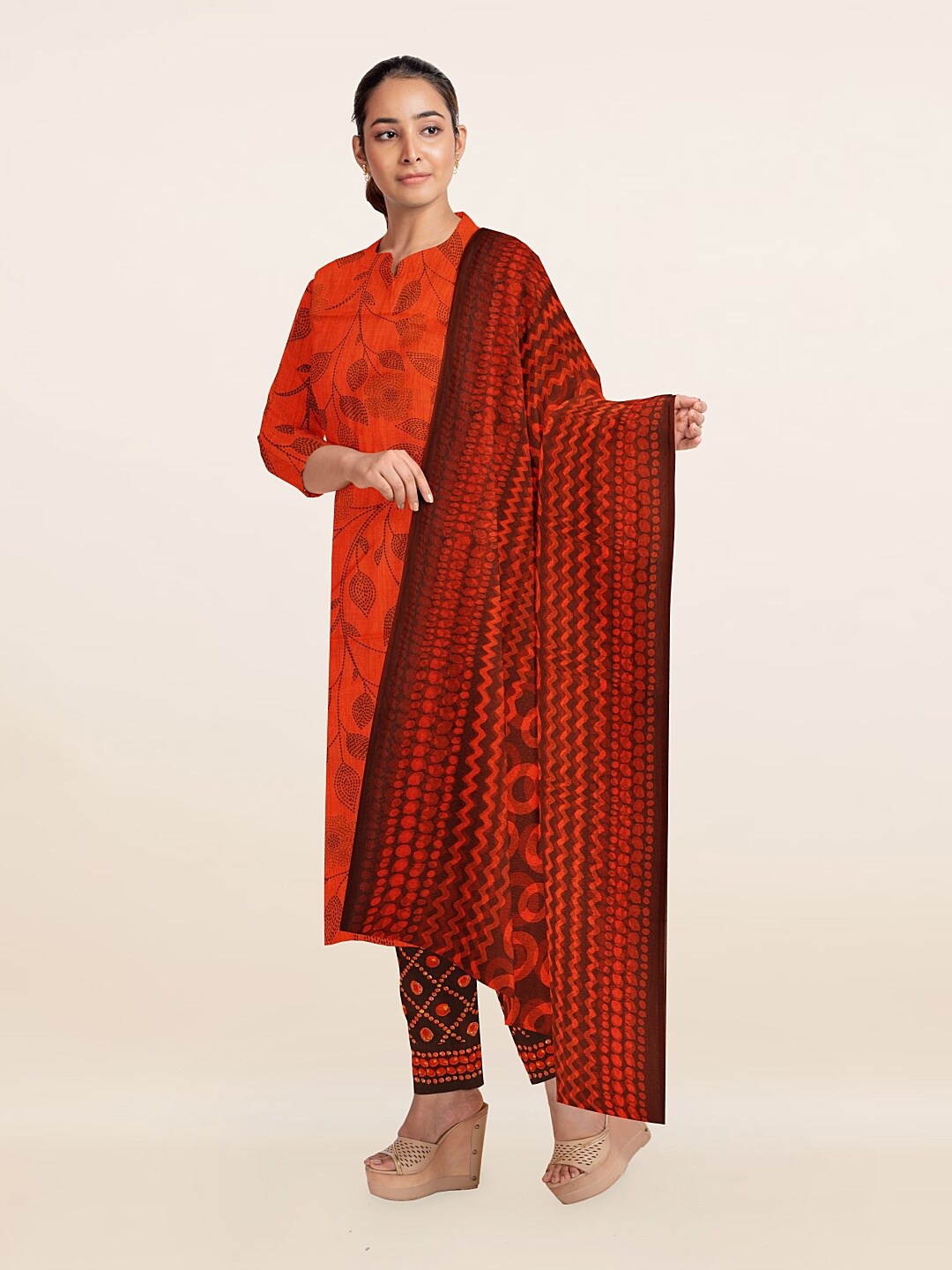 

Pothys Orange & Black Printed Unstitched Dress Material