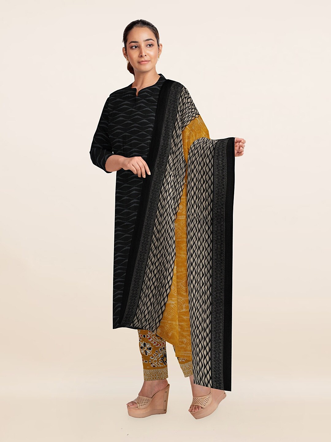 

Pothys Black & Mustard Yellow Printed Unstitched Dress Material