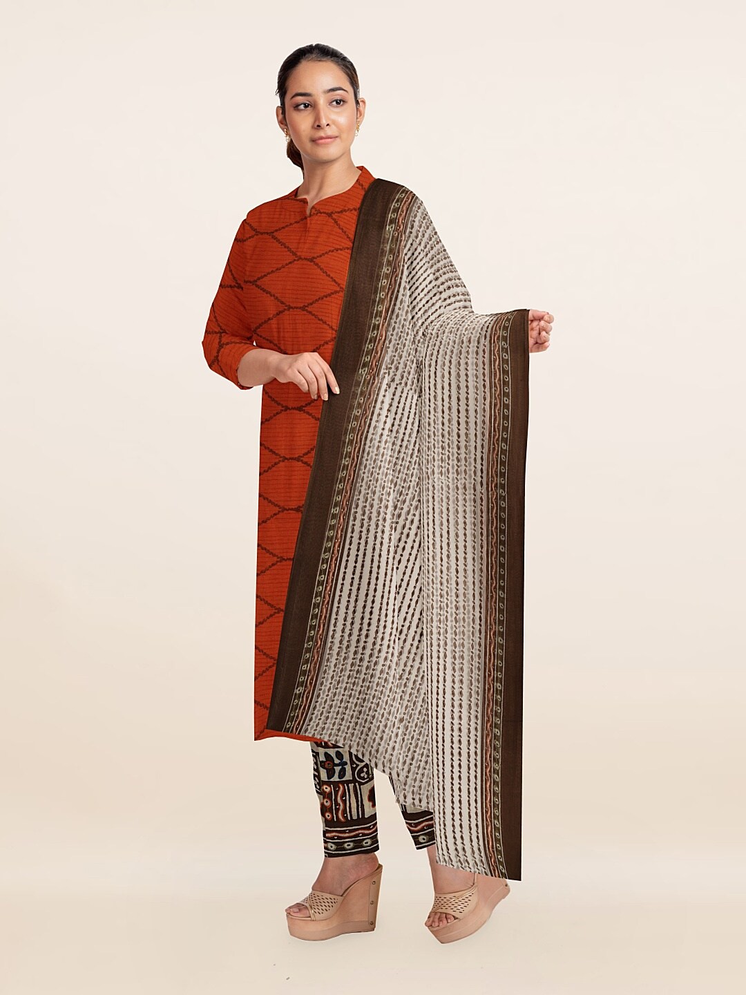 

Pothys Red & Brown Printed Unstitched Dress Material