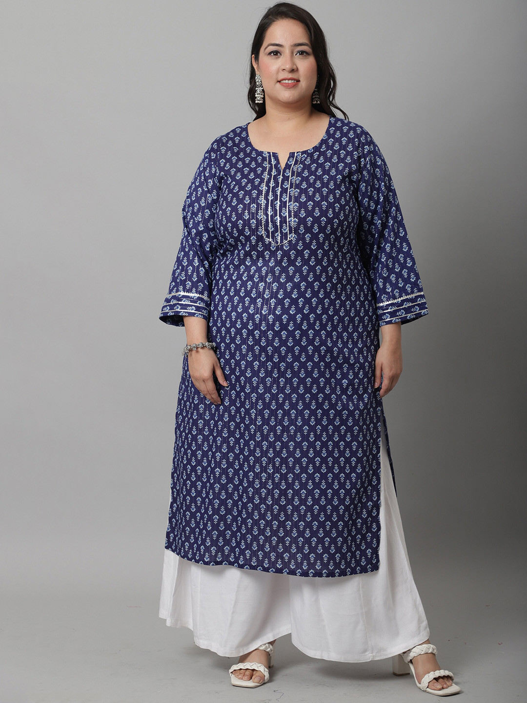 

Rajnandini Women Navy Blue Ethnic Motifs Printed Flared Sleeves Kurta