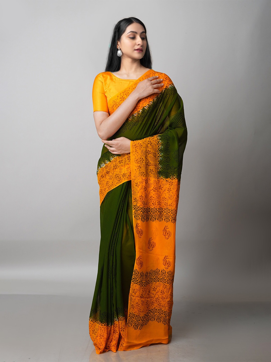 

Unnati Silks Olive Green & Orange Floral Block Print Saree