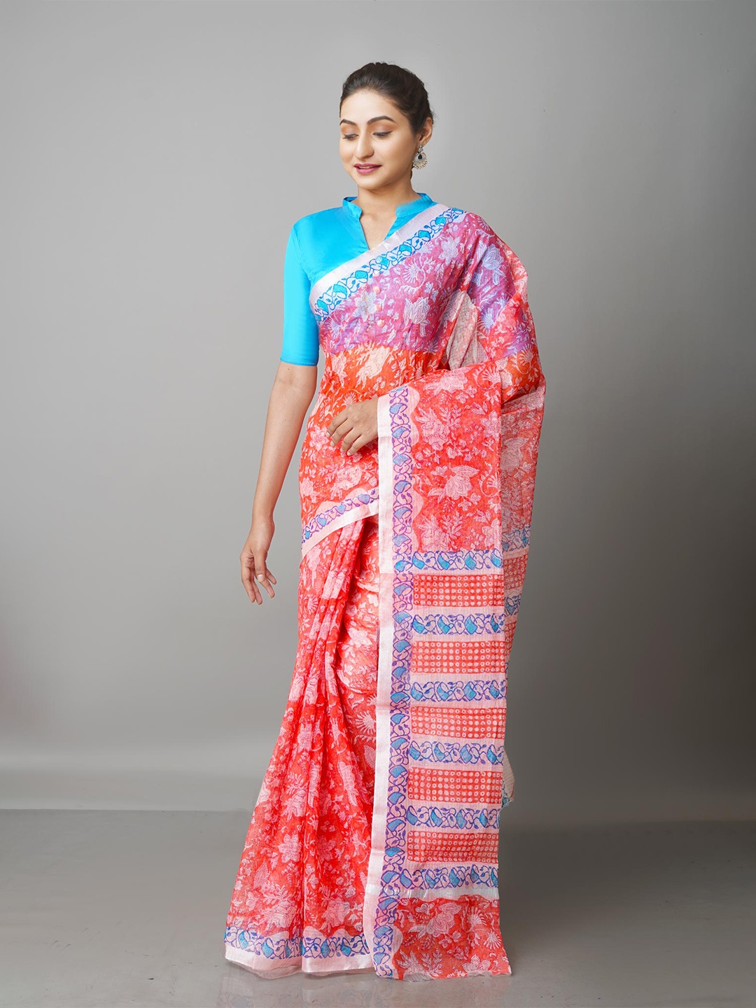 

Unnati Silks Coral & Blue Ethnic Motifs Zari Pure Cotton Kota Saree