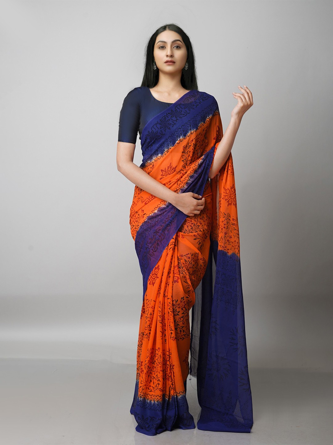 

Unnati Silks Orange & Blue Floral Block Print Saree