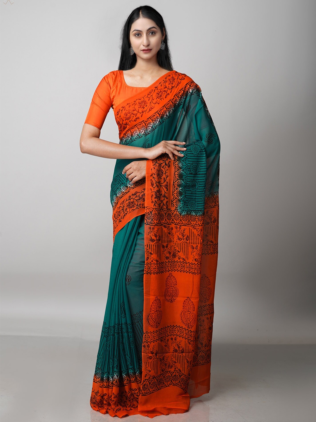 

Unnati Silks Green & Orange Floral Block Print Saree