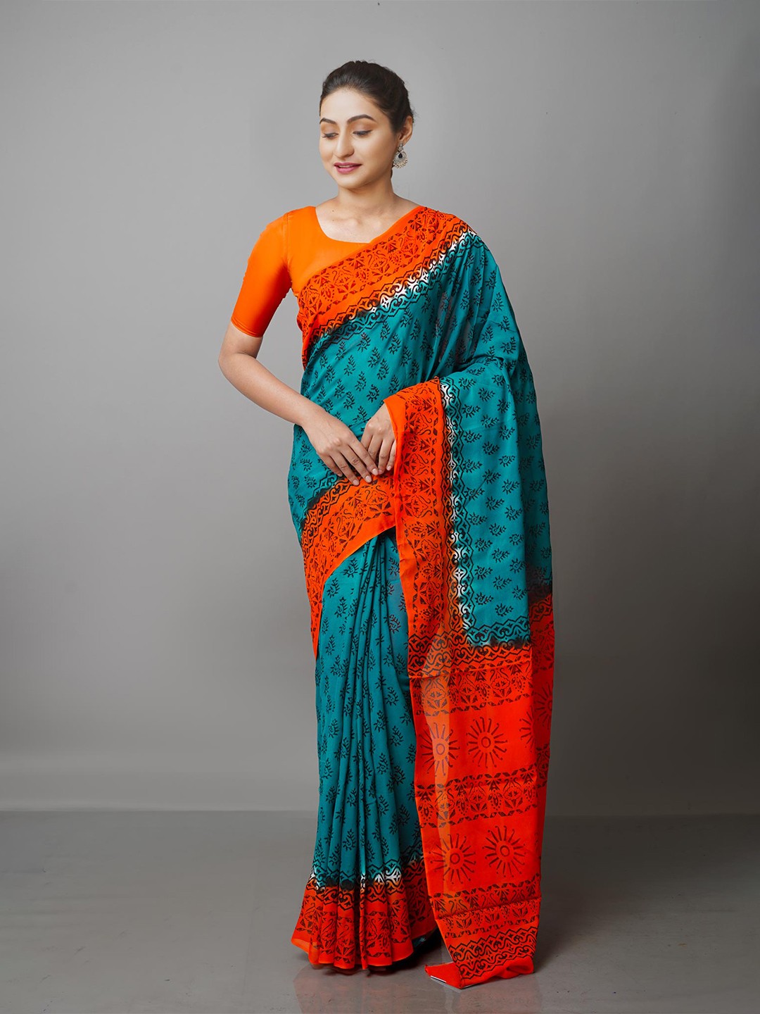 

Unnati Silks Green & Orange Ethnic Motifs Block Print Saree
