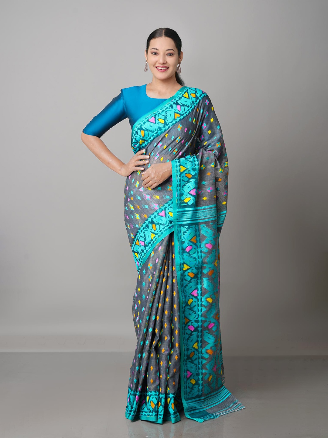 

Unnati Silks Grey & Green Zari Silk Cotton Jamdani Saree