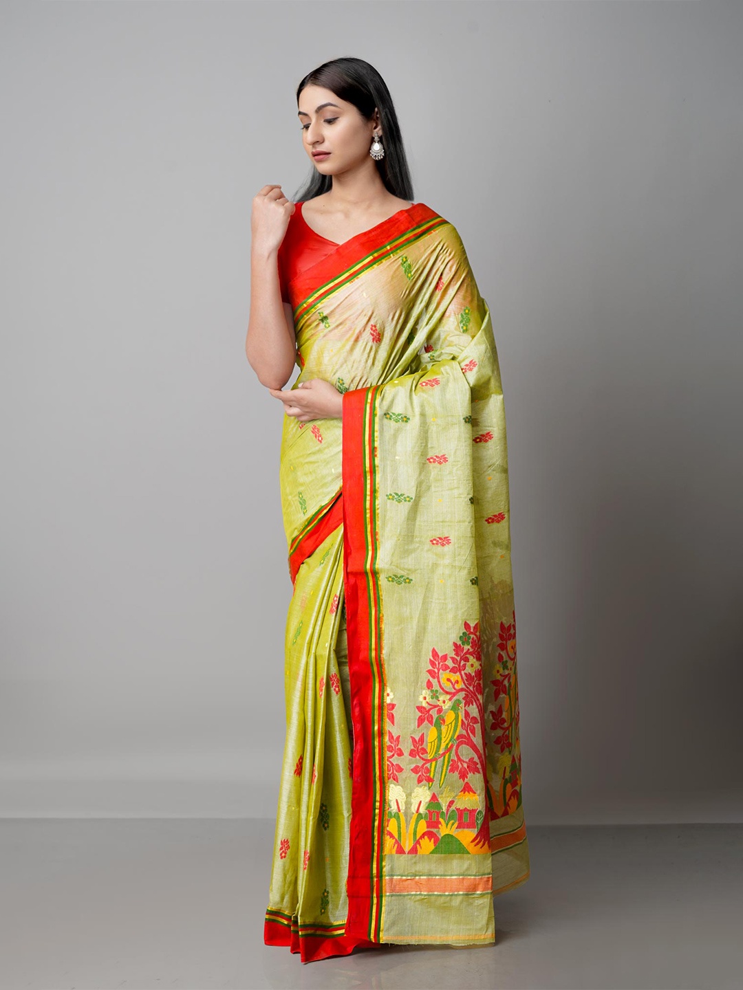 

Unnati Silks Green & Red Ethnic Motifs Zari Pure Cotton Tussar Saree