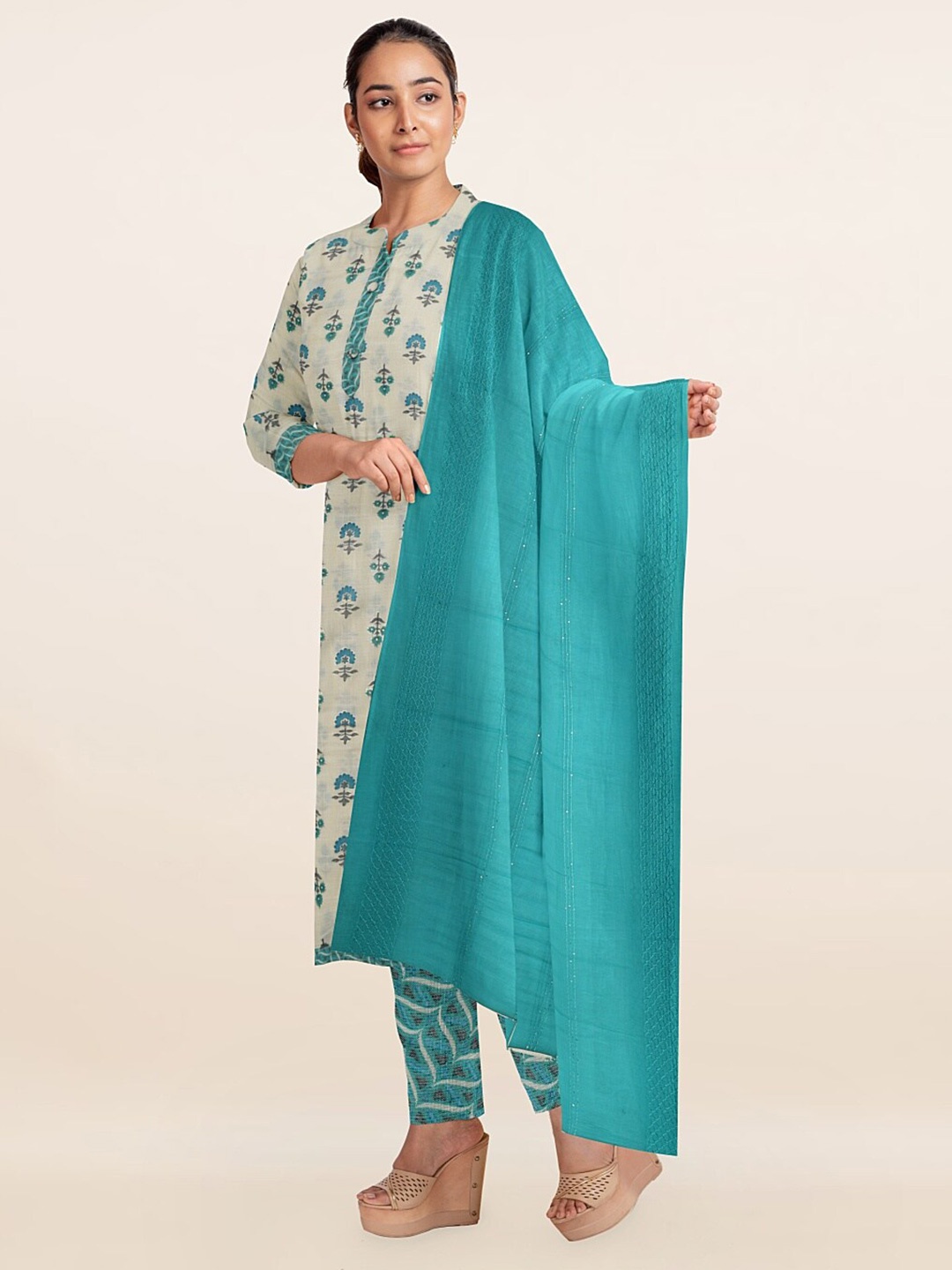 

Pothys Cream-Coloured & Sea Green Printed Viscose Rayon Unstitched Dress Material