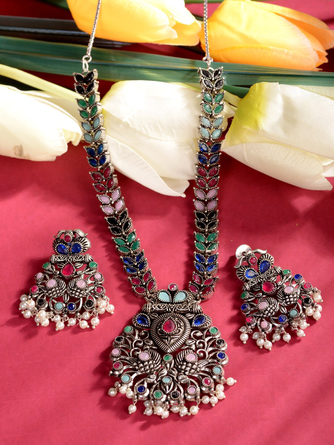 

Saraf RS Jewellery Oxidised Rhodium-Plated Silver-Toned White & Green AD-Studded & Pearl Beaded Jewellery Set