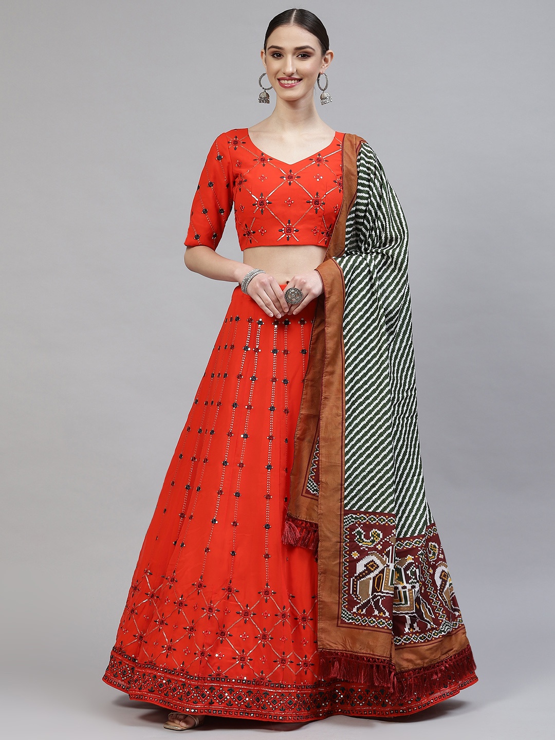

SHUBHKALA Orange Embroidered Semi-Stitched Lehenga & Blouse With Dupatta