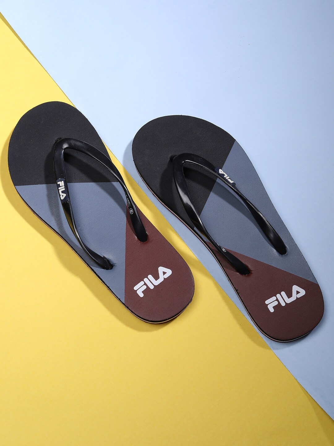 

FILA Women Black & Grey Colourblocked Rubber Thong Flip-Flops