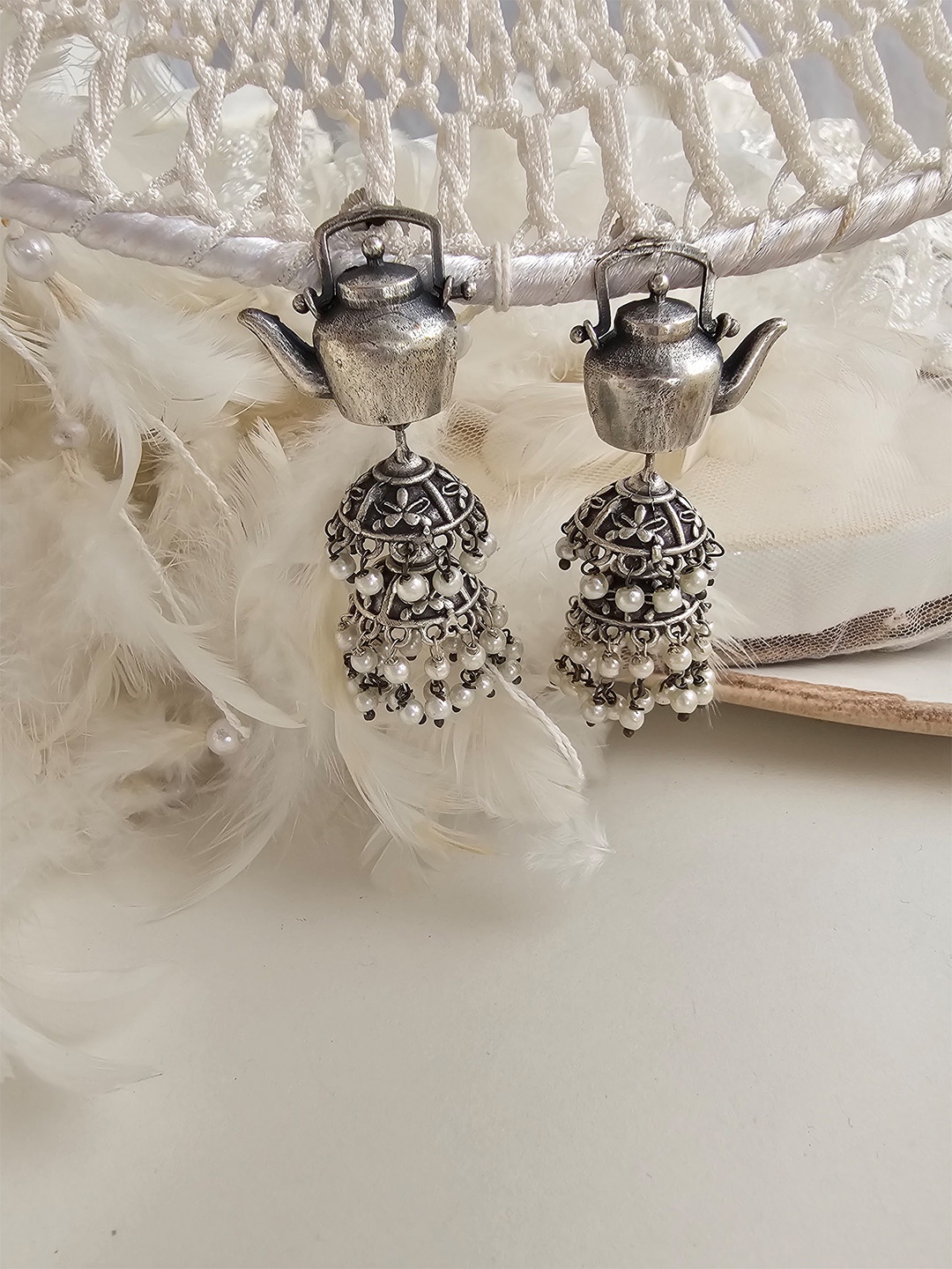 

Binnis Wardrobe White & Silver-Plated Contemporary Jhumkas Earrings