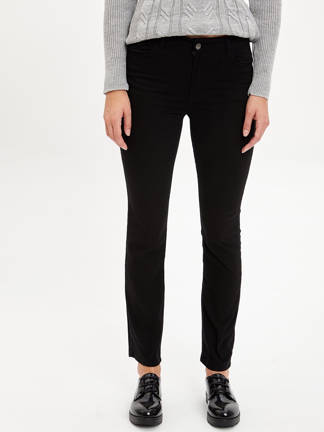 

DeFacto Women Black Solid Cotton Trousers