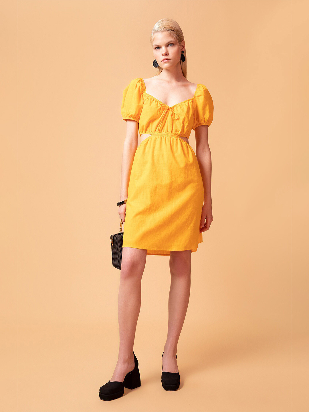 

DeFacto Yellow Cotton Solid Sheath Dress