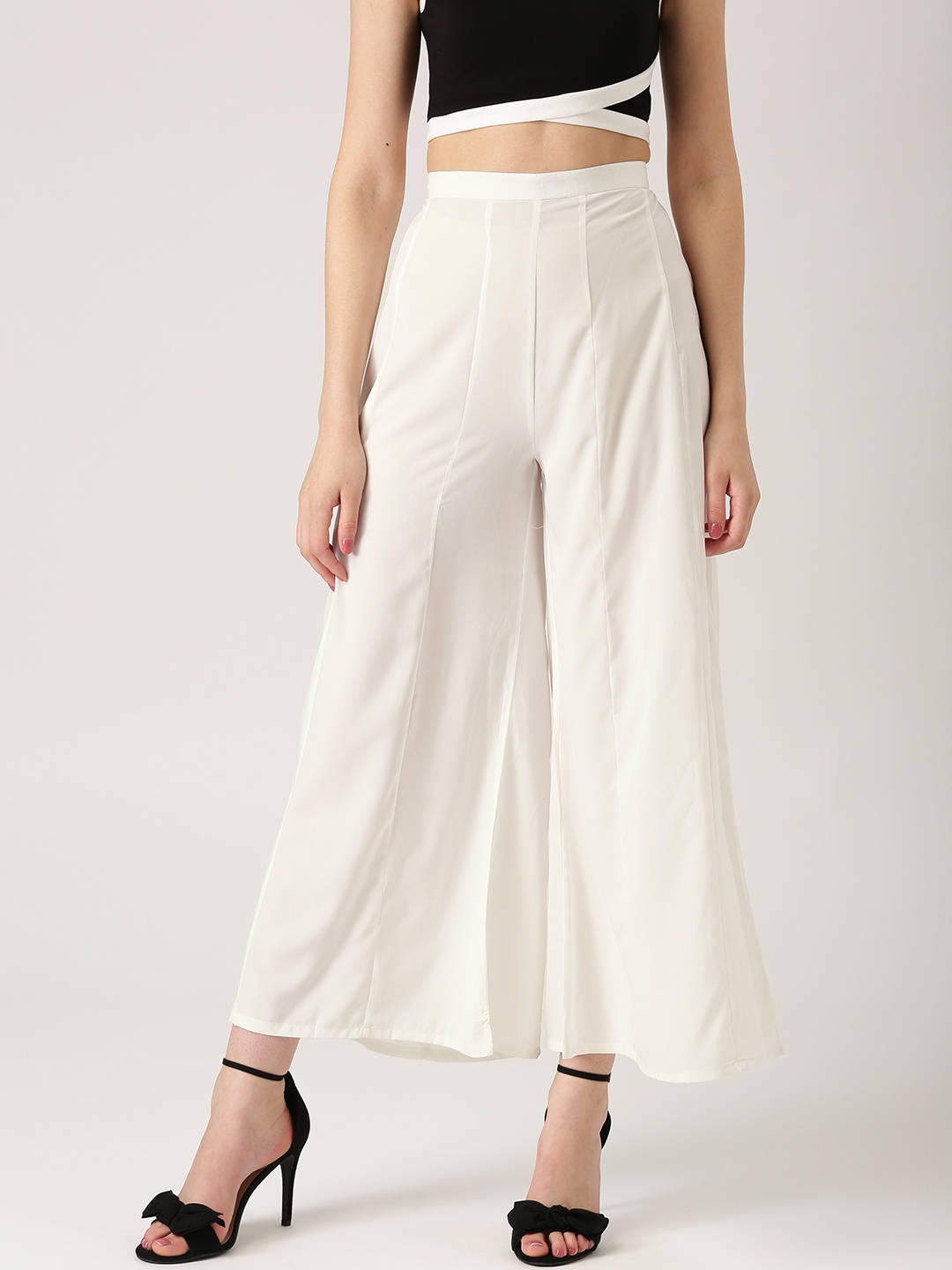 

Libas Women White Flared Solid Crepe Palazzos