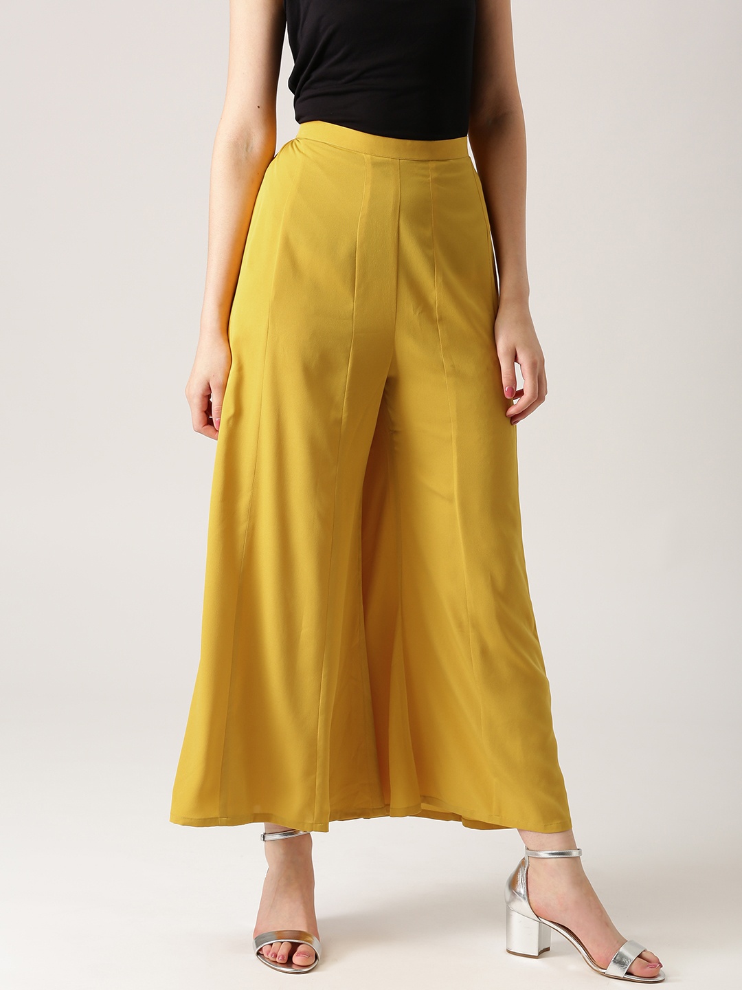 

Libas Women Mustard Yellow Solid Crepe Flared Palazzos
