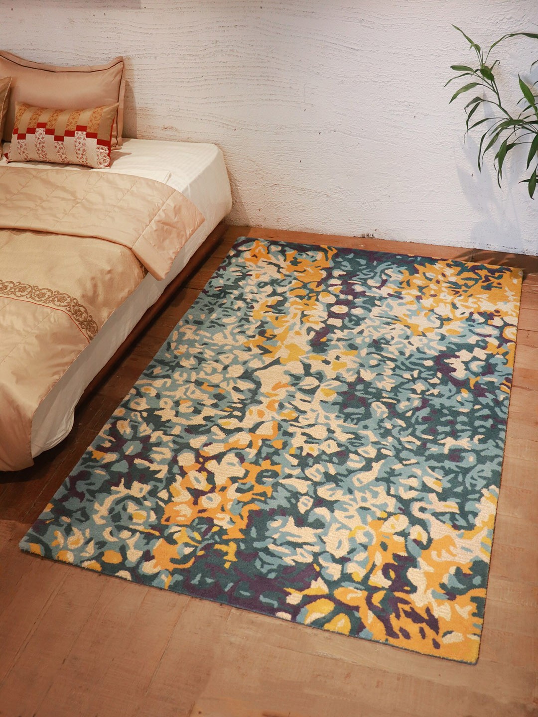 

ZEBA Blue & Yellow Floral Hand Tufted Woolen Carpets