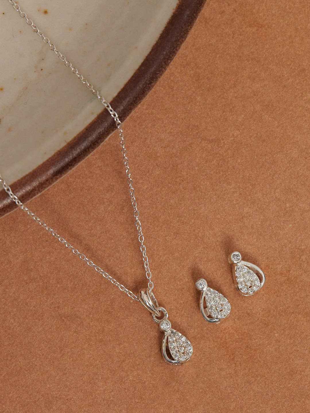 

Studio Voylla Women 925 Sterling Silver CZ stone Curve Interlink Pendant Set