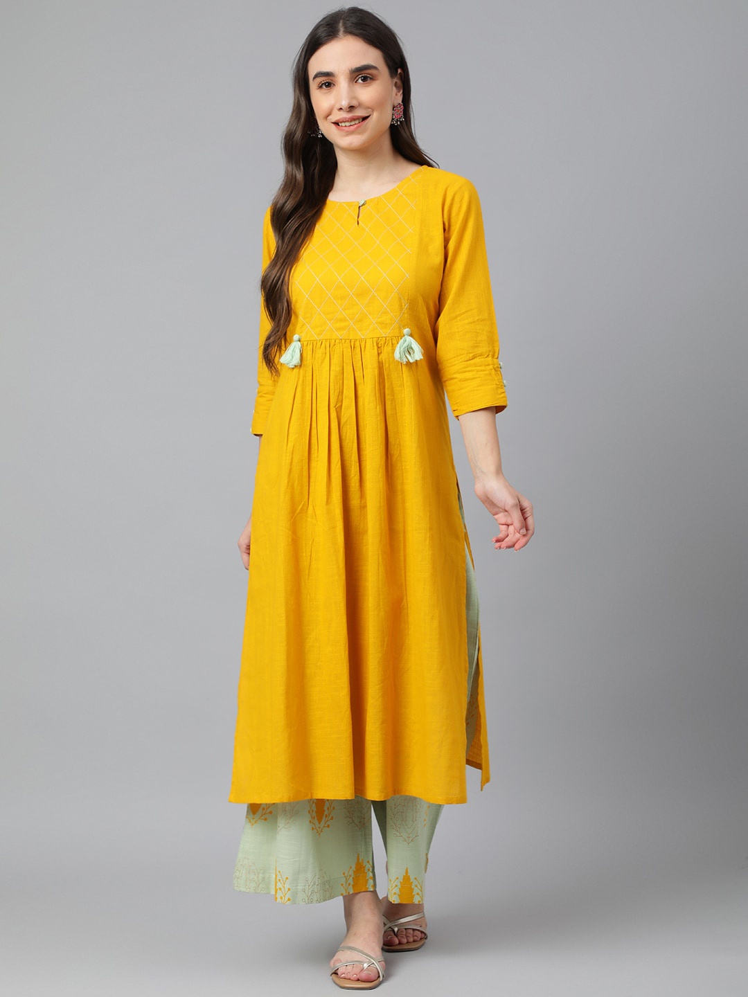 

Idalia Women Yellow Ethnic Motifs Kurta with Palazzos