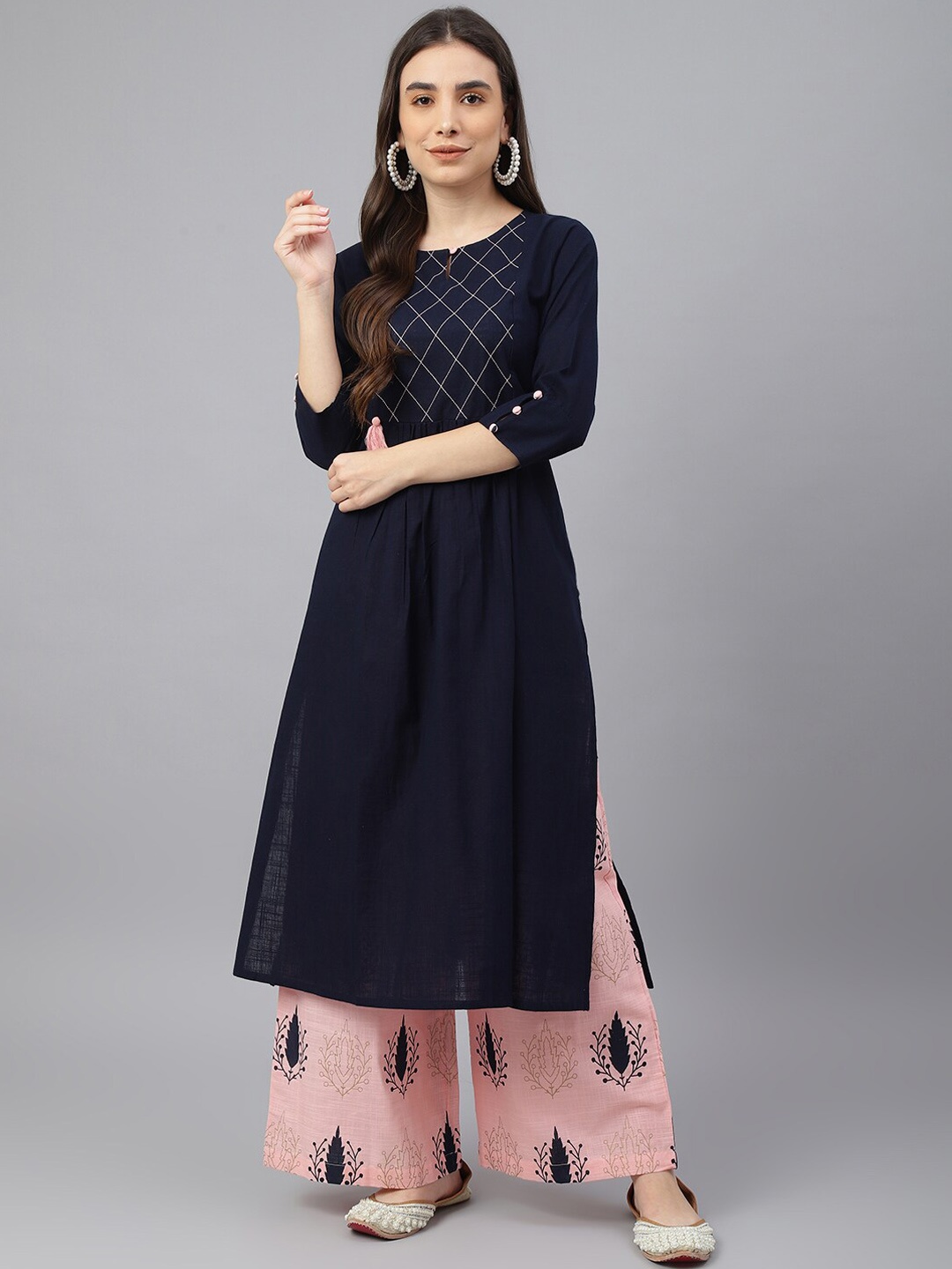 

Idalia Women Navy Blue Ethnic Motifs Yoke Design Pleated Thread Work Cotton Kurta Set