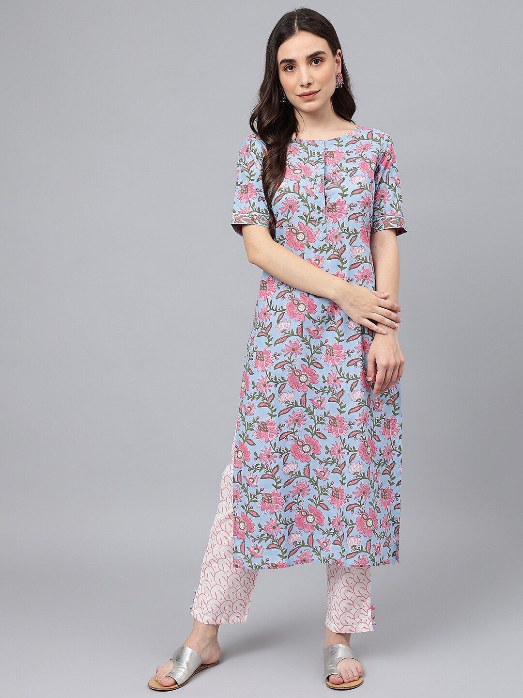 

Idalia Women Blue Floral Printed Kurta with Trousers