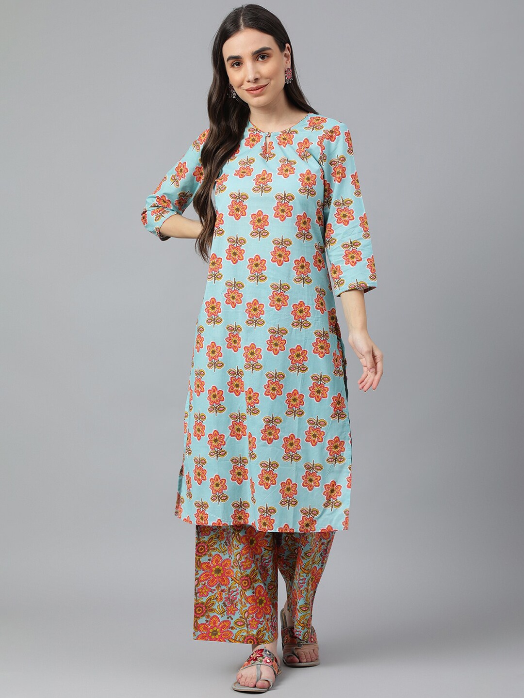

Idalia Women Turquoise Blue Floral Printed Cotton Kurta With Palazzos