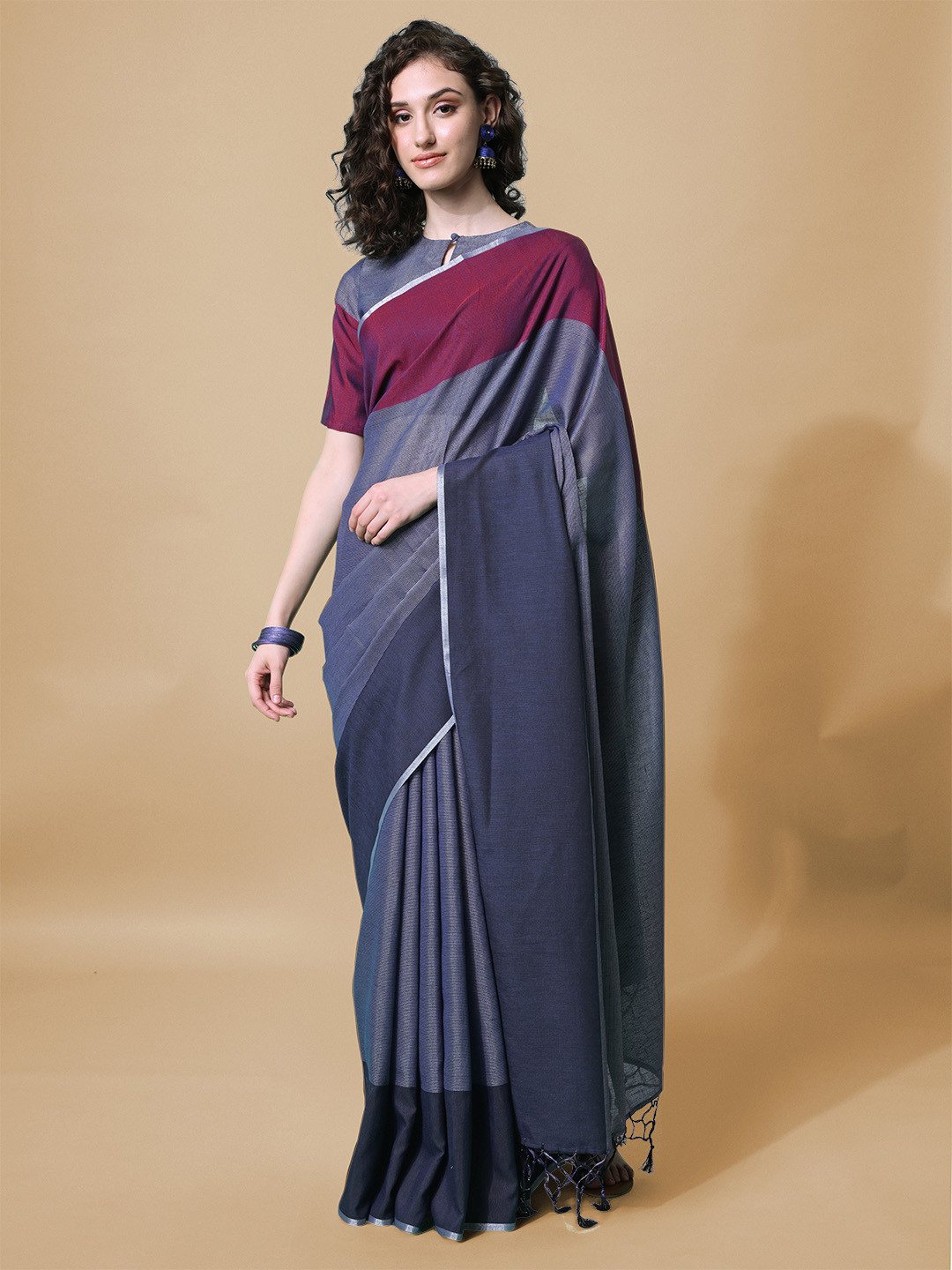 

Inddus Navy Blue & Maroon Woven Design Saree