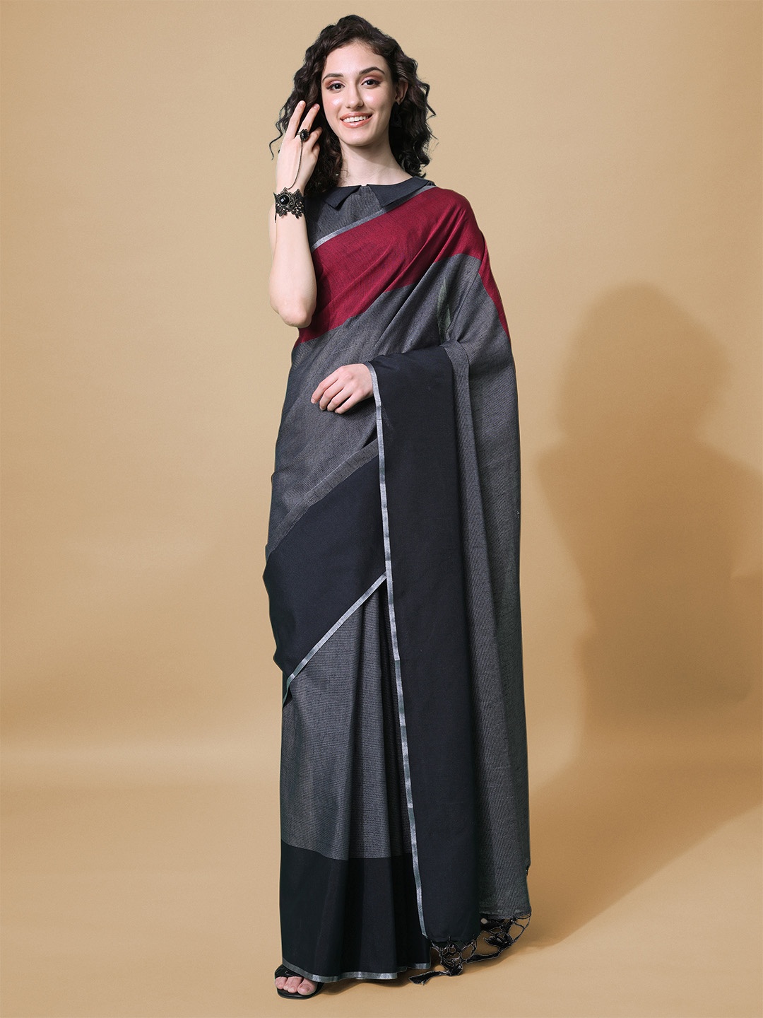 

Inddus Black & Red Woven Design Saree