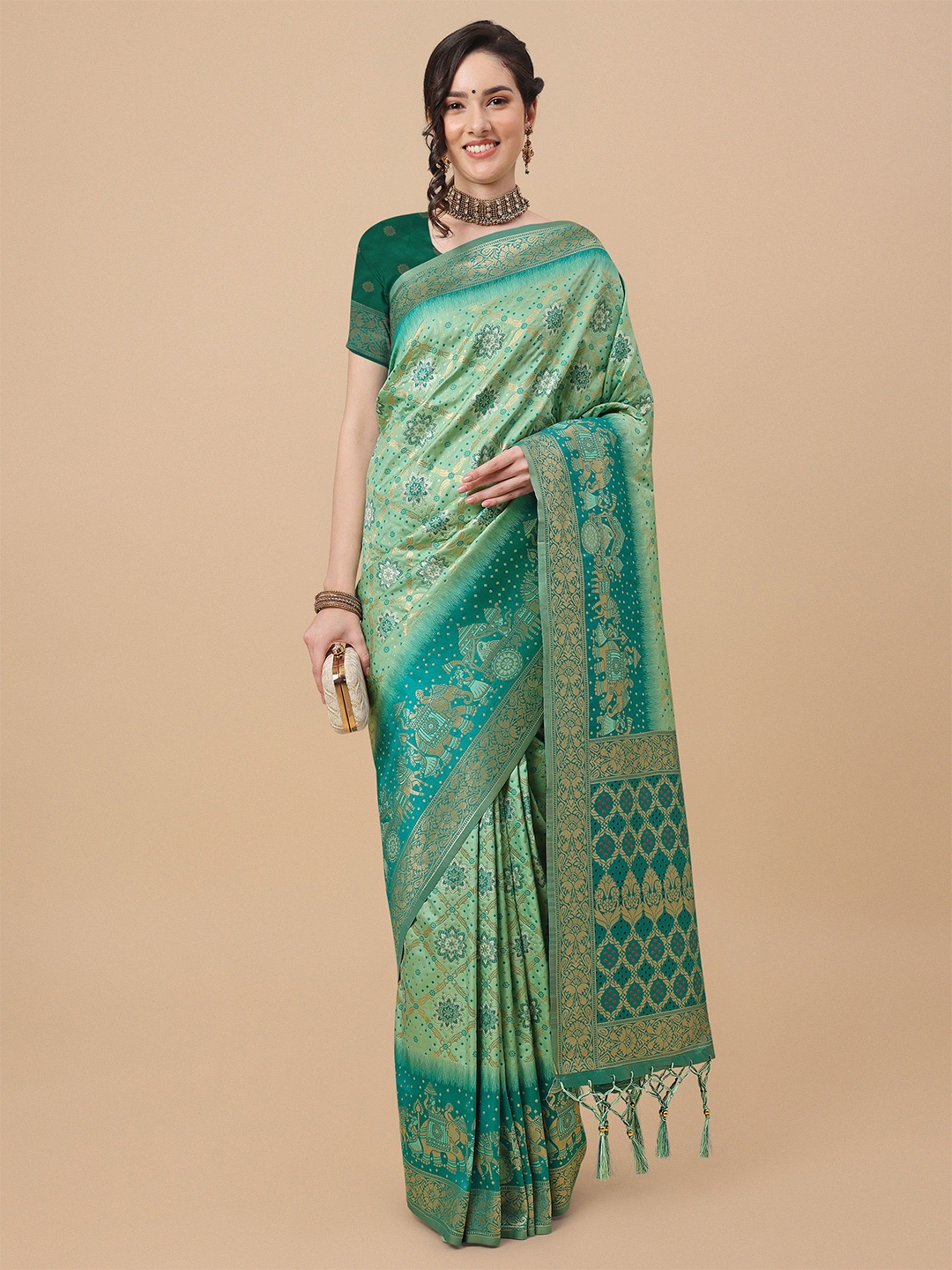 

Mitera Teal & Gold-Toned Ethnic Motifs Zari Silk Blend Banarasi Saree