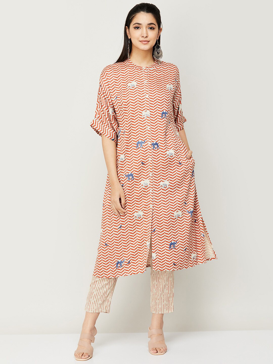 

Melange by Lifestyle Women Off White Printed Kurta with Trousers
