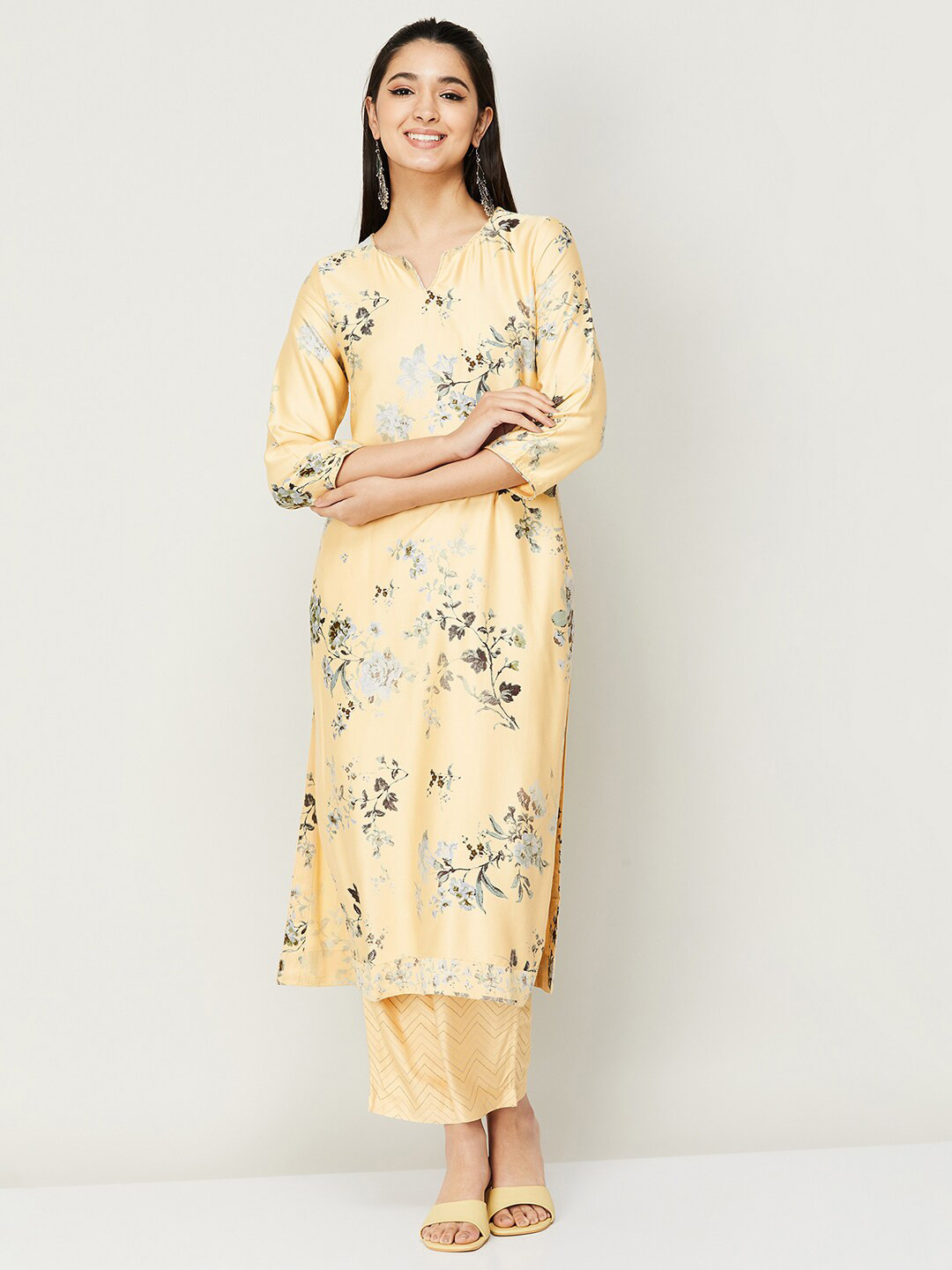

Melange by Lifestyle Women Yellow Floral Printed Kurta with Trousers