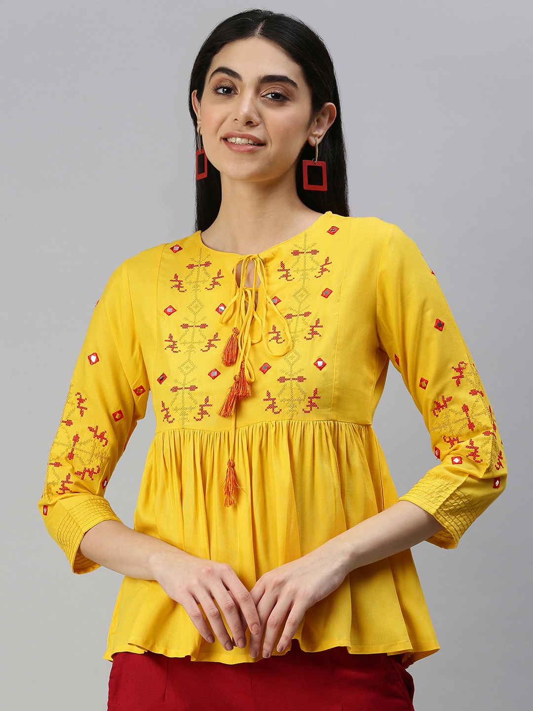 

MALHAAR Yellow & Red Ethnic Motifs Embroidered A-Line Kurti